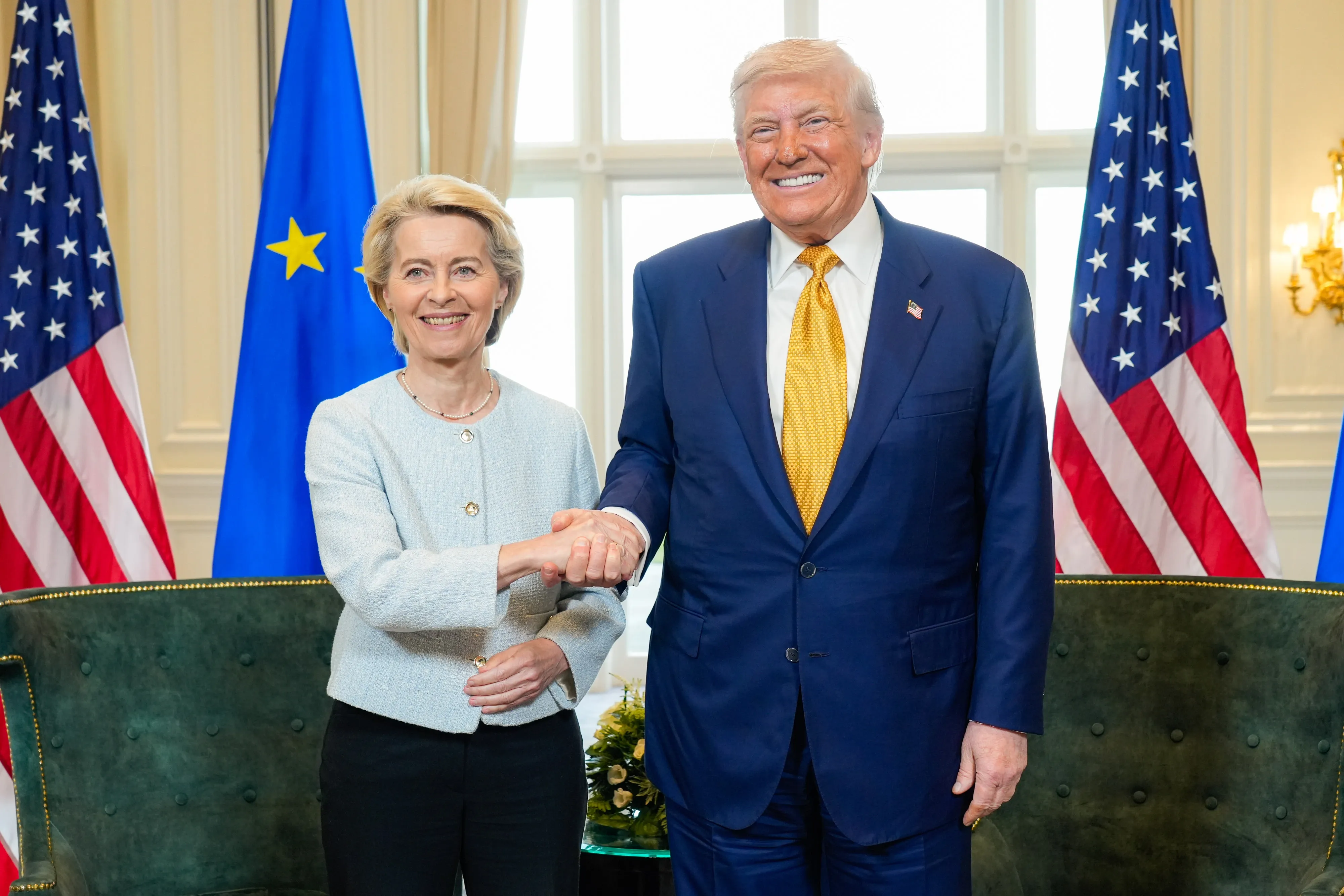 President Von der Leyen shaking hands with Trump