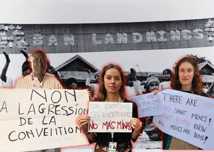 Image of activists holding banners calling for a ban on landmines
